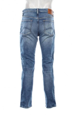 Męskie jeansy Tommy Jeans, Rozmiar M, Kolor Niebieski, Cena 136,99 zł