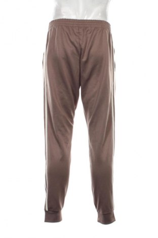 Pantaloni trening de bărbați Adidas Originals, Mărime L, Culoare Maro, Preț 135,99 Lei