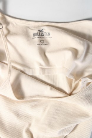 Γυναικείο αμάνικο μπλουζάκι Hollister, Μέγεθος L, Χρώμα Εκρού, Τιμή 4,34 €