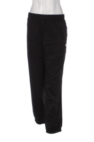 Γυναικείο αθλητικό παντελόνι PUMA, Μέγεθος L, Χρώμα Μαύρο, Τιμή 13,46 €