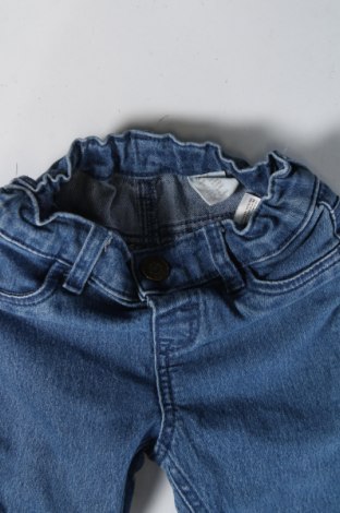 Dziecięce jeansy H&M, Rozmiar 6-9m/ 68-74 cm, Kolor Niebieski, Cena 20,67 zł