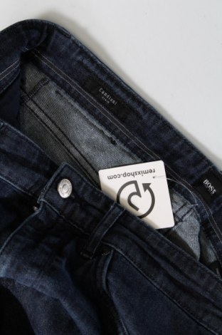 Pánske džínsy  BOSS, Veľkosť M, Farba Modrá, Cena  54,25 €