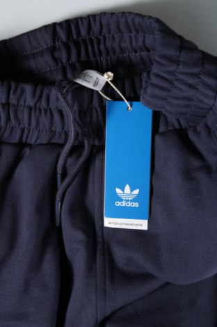 Męskie spodnie sportowe Adidas Originals, Rozmiar S, Kolor Niebieski, Cena 115,95 zł