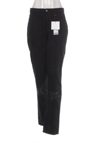 Damskie jeansy Boohoo, Rozmiar L, Kolor Czarny, Cena 56,99 zł