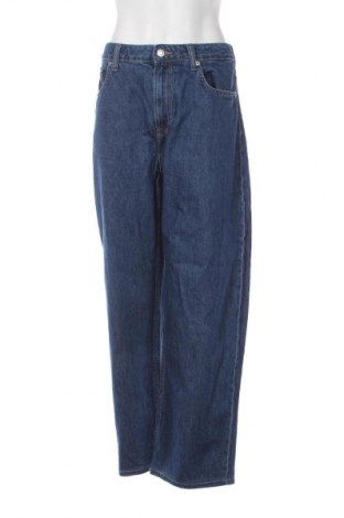 Damskie jeansy H&M, Rozmiar L, Kolor Niebieski, Cena 110,01 zł