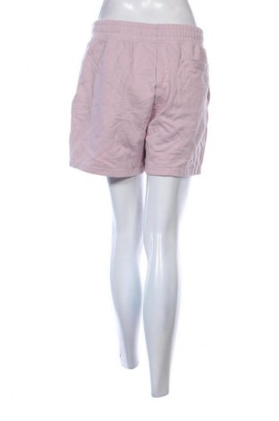 Γυναικείο κοντό παντελόνι New Balance, Μέγεθος M, Χρώμα Σάπιο μήλο, Τιμή 11,99 €