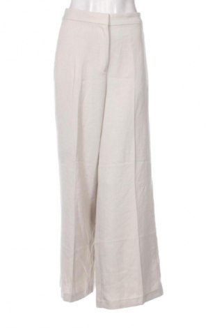 Damskie spodnie H&M, Rozmiar M, Kolor Kolorowy, Cena 22,99 zł