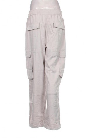 Damskie spodnie Manfinity, Rozmiar L, Kolor Beżowy, Cena 44,99 zł