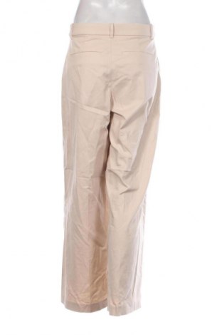 Pantaloni de femei Uniqlo, Mărime M, Culoare Ecru, Preț 63,99 Lei
