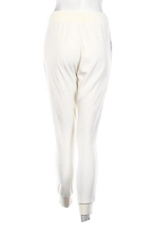 Damskie spodnie sportowe Champion, Rozmiar M, Kolor ecru, Cena 91,09 zł