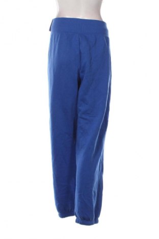 Pantaloni trening de femei Nike, Mărime L, Culoare Albastru, Preț 200,99 Lei