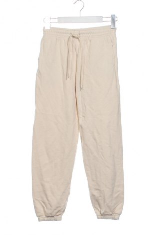 Damskie spodnie sportowe Uniqlo, Rozmiar S, Kolor Beżowy, Cena 46,99 zł