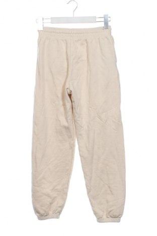 Damskie spodnie sportowe Uniqlo, Rozmiar S, Kolor Beżowy, Cena 46,99 zł