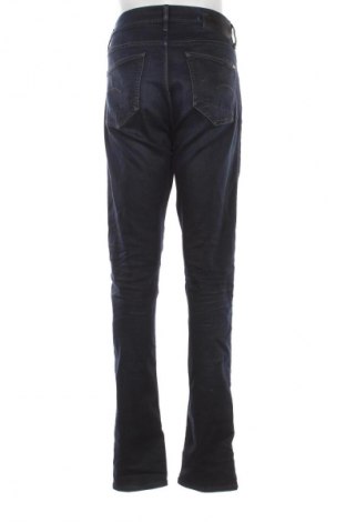 Męskie jeansy G-Star Raw, Rozmiar L, Kolor Niebieski, Cena 358,48 zł