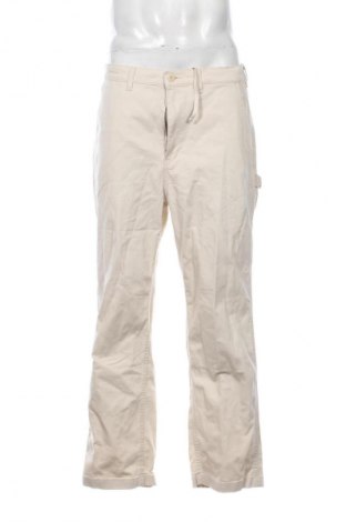 Pánské kalhoty  Uniqlo, Velikost L, Barva Krémová, Cena  239,00 Kč