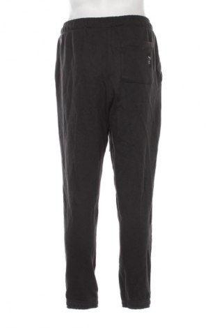 Męskie spodnie sportowe PUMA, Rozmiar M, Kolor Czarny, Cena 92,99 zł