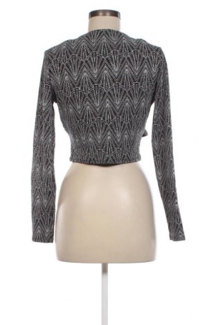 Bluzka damska H&M Divided, Rozmiar L, Kolor Kolorowy, Cena 12,76 zł