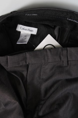 Dětské kalhoty  Calvin Klein, Velikost 11-12y/ 152-158 cm, Barva Šedá, Cena  933,00 Kč