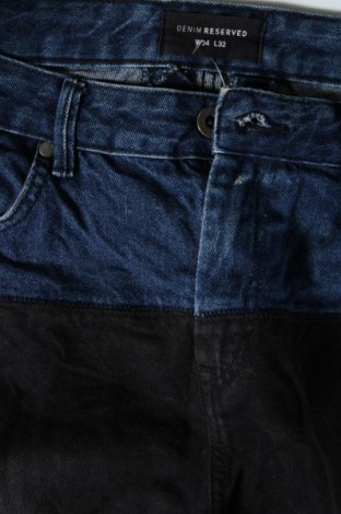 Męskie jeansy Reserved, Rozmiar L, Kolor Niebieski, Cena 80,46 zł