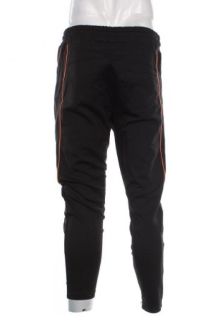 Herren Sporthose Cruyff, Größe M, Farbe Schwarz, Preis 33,99 €