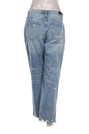 Damskie jeansy Flamingo, Rozmiar L, Kolor Niebieski, Cena 52,99 zł