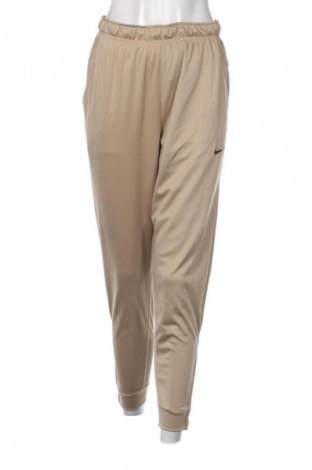 Damen Sporthose Nike, Größe S, Farbe Beige, Preis 61,99 €