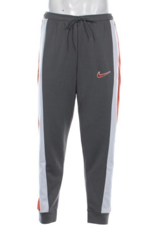 Męskie spodnie sportowe Nike, Rozmiar L, Kolor Kolorowy, Cena 290,99 zł