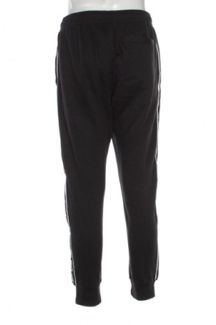 Męskie spodnie sportowe Nike, Rozmiar M, Kolor Czarny, Cena 129,99 zł