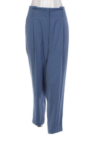 Damskie spodnie H&M, Rozmiar XL, Kolor Niebieski, Cena 36,40 zł