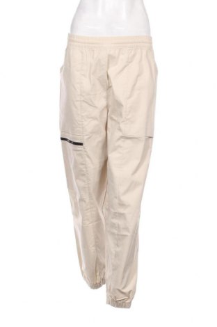 Dámské kalhoty  New Balance, Velikost S, Barva Krémová, Cena  1 696,00 Kč