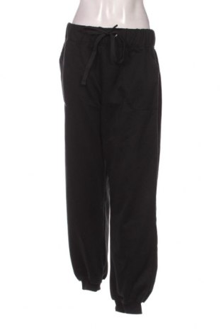 Γυναικείο αθλητικό παντελόνι Janina, Μέγεθος XL, Χρώμα Μαύρο, Τιμή 10,41 €