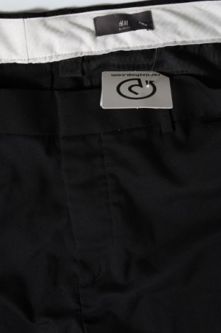 Męskie spodnie H&M, Rozmiar XL, Kolor Czarny, Cena 36,67 zł