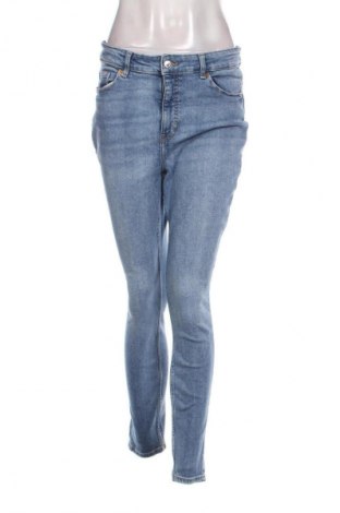 Damskie jeansy H&M, Rozmiar M, Kolor Niebieski, Cena 70,78 zł
