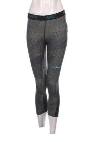 Damskie legginsy Nike, Rozmiar S, Kolor Kolorowy, Cena 148,67 zł