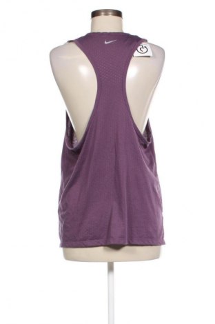 Top sport de damă. Nike, Mărime L, Culoare Mov, Preț 110,99 Lei