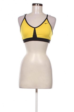 Top sport de damă. Nike, Mărime L, Culoare Galben, Preț 56,99 Lei