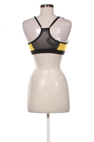 Top sport de damă. Nike, Mărime L, Culoare Galben, Preț 56,99 Lei
