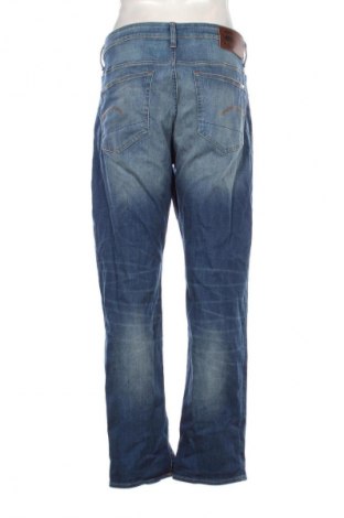 Męskie jeansy G-Star Raw, Rozmiar L, Kolor Niebieski, Cena 301,99 zł