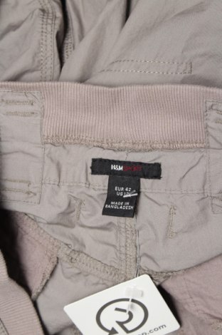 Дамски спортен панталон H&M Sport, Размер L, Цвят Бежов, Цена 21,25 лв.