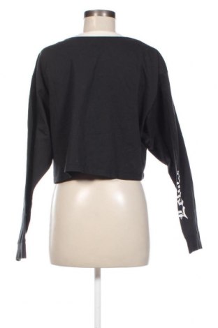 Γυναικεία μπλούζα Levi's, Μέγεθος M, Χρώμα Μαύρο, Τιμή 52,58 €