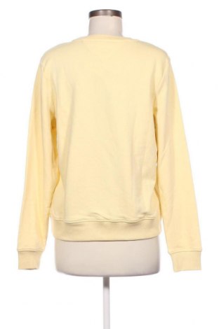 Γυναικεία μπλούζα Tommy Jeans, Μέγεθος M, Χρώμα Κίτρινο, Τιμή 39,40 €