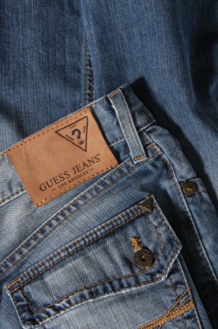 Damskie jeansy Guess, Rozmiar XL, Kolor Niebieski, Cena 107,55 zł