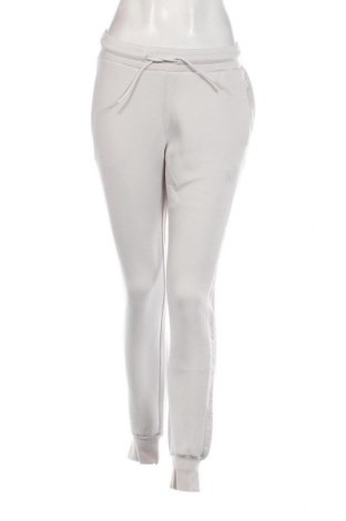 Γυναικείο αθλητικό παντελόνι Guess, Μέγεθος M, Χρώμα Εκρού, Τιμή 63,40 €