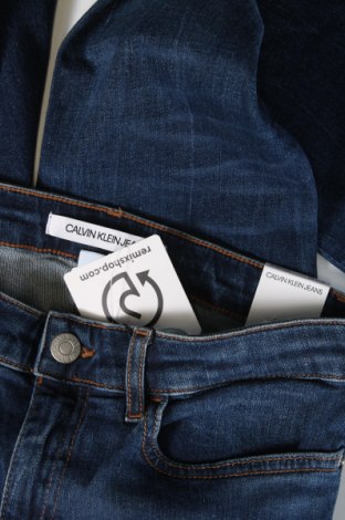 Dziecięce jeansy Calvin Klein Jeans, Rozmiar 13-14y/ 164-168 cm, Kolor Niebieski, Cena 145,27 zł