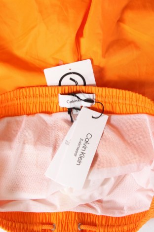 Мъжки бански Calvin Klein Swimwear, Размер S, Цвят Оранжев, Цена 60,80 лв.