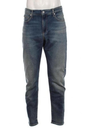 Męskie jeansy Calvin Klein Jeans, Rozmiar XL, Kolor Niebieski, Cena 340,96 zł