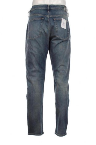Męskie jeansy Calvin Klein Jeans, Rozmiar XL, Kolor Niebieski, Cena 215,07 zł