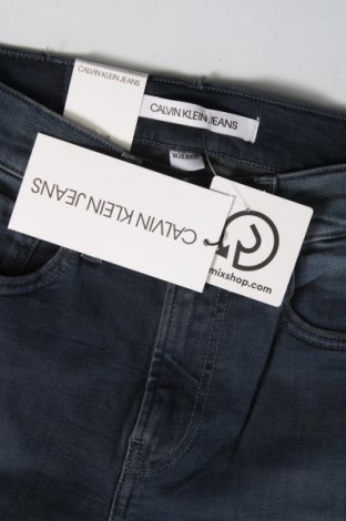 Męskie jeansy Calvin Klein Jeans, Rozmiar S, Kolor Niebieski, Cena 246,71 zł