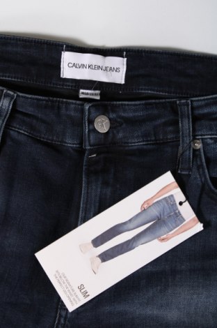 Męskie jeansy Calvin Klein Jeans, Rozmiar XL, Kolor Niebieski, Cena 474,45 zł