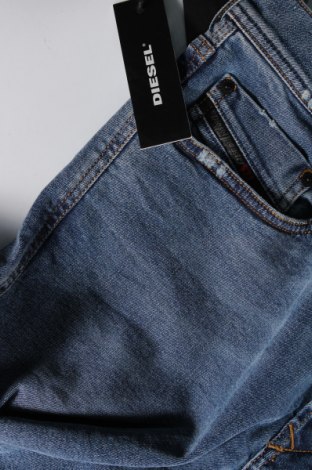 Męskie jeansy Diesel, Rozmiar M, Kolor Niebieski, Cena 656,34 zł